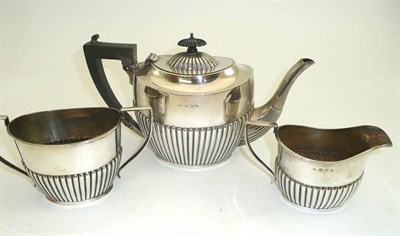 Lot 28 - Three piece silver tea service
