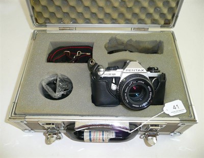 Lot 41 - A Pentax ME super camera and flight case