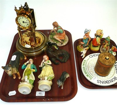 Lot 48 - Two trays including an anniversary clock, an advertising platter, Continental figures, Beswick...