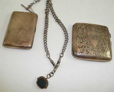 Lot 52 - Silver cigarette case, another and silver watch chains (one hung with a fob)