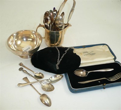 Lot 57 - A small quantity of silver including a milk jug, sugar bowl, Christening set, teaspoons and tongs