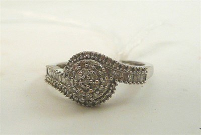 Lot 89 - A 9ct white gold diamond cluster ring