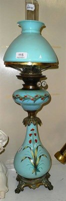 Lot 115 - Victorian oil lamp with painted blue glass body