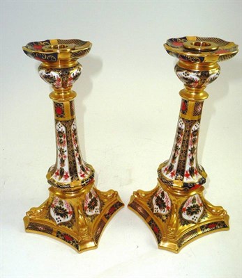Lot 123 - A pair of Royal Crown Derby 1128 candlesticks