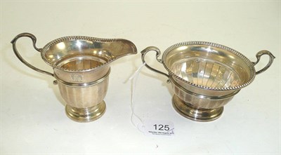 Lot 125 - Silver sugar basin and cream jug