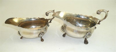 Lot 138 - Silver sauce boat, maker's mark London EB, inscribed WP Martin from Ilminster GS 1934 and...