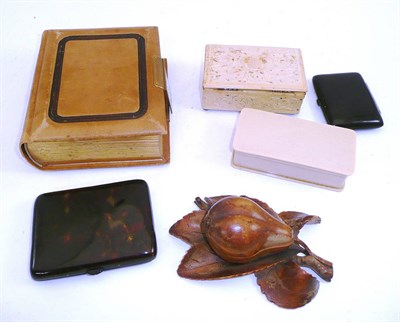 Lot 151 - Two tortoiseshell cigarette cases, carved wood inkwell, photo album and trinket boxes