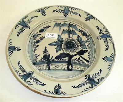 Lot 157 - A Continental Delft plate with blue and white decoration