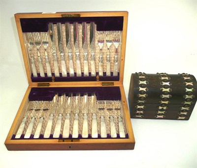 Lot 166 - A walnut cased set of Victorian dessert knives and forks and a small coromandel domed...