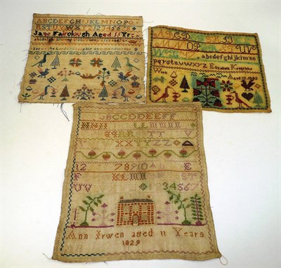 Lot 168 - Unframed sampler worked by Ann Irwen 1829, depicting alphabet and a decorative house, 24 cm by...