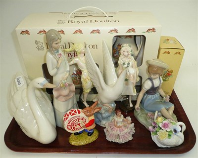 Lot 174 - Lladro girl (nicks to flowers), three Spanish figures, two Albany Fine China figures (boxed), Royal