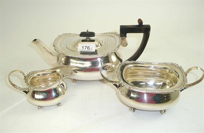 Lot 176 - A silver three piece tea set