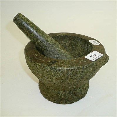 Lot 194 - A pestle and mortar