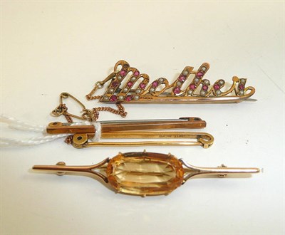 Lot 207 - A 'Mother' brooch, a citrine brooch and two bar brooches