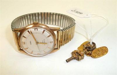 Lot 208 - A pair of 9ct gold cuff links, a watch key and a 9ct gold gent's wristwatch face inscribed 'BERNEX'