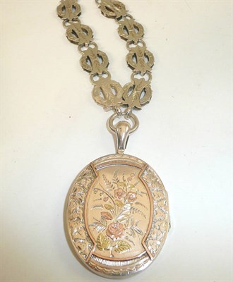 Lot 210 - A silver locket on chain
