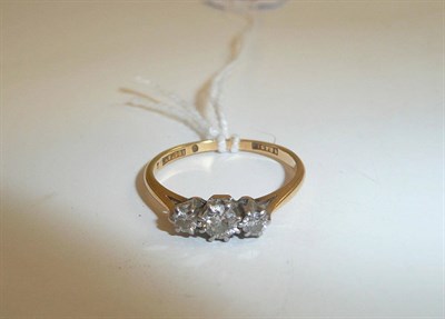 Lot 238 - A diamond three stone ring