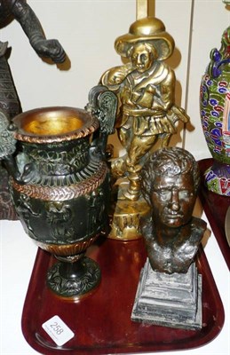 Lot 258 - Brass figural doorstop, bronze bust of a gent and a classical-style twin handled vase (3)
