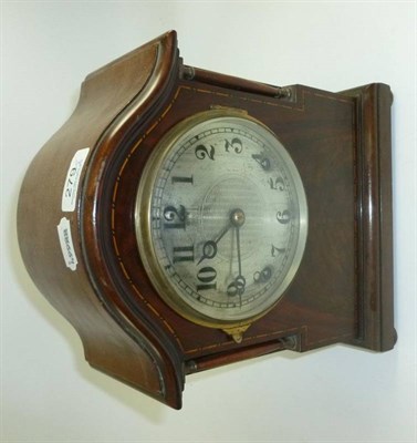 Lot 279 - Brass trivet and an Edwardian mahogany mantel clock