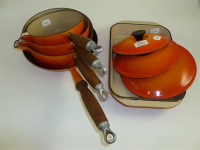 Lot 284 - Three Le Creuset pans and covers, a frying pan and a casserole dish