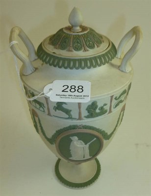 Lot 288 - A Wedgwood tri-colour Jasperware urn decorated with signs of the Zodiac