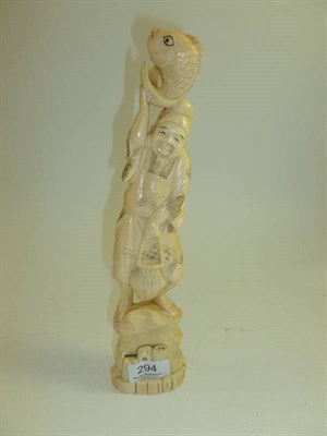 Lot 294 - A Chinese marine ivory figure of a fisherman