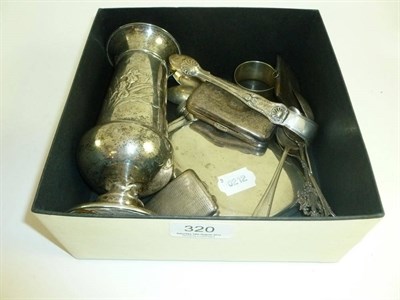 Lot 320 - A silver trumpet vase, two match cases, a cigarette case, pair of sugar tongs, plated hip flask etc