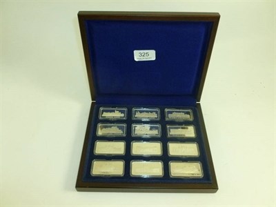 Lot 325 - A set of twelve silver ingots each with castles and palaces of the UK