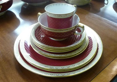 Lot 333 - An extensive Shelley dinner service with gilt and maroon spotted borders