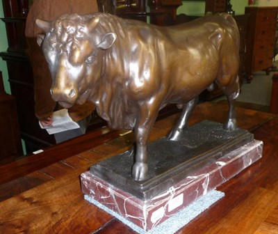 Lot 337 - A bronze of a bull on marble base