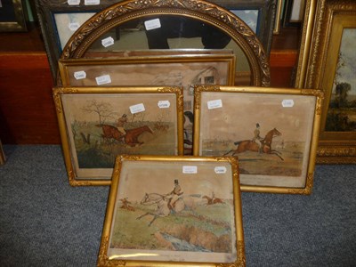 Lot 405 - An oil on canvas of figures near cottages, oval mirror, print of Ireland and four hunting prints