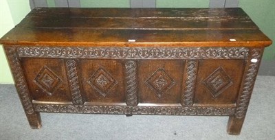 Lot 423 - A joined oak chest, 17th century and later, the associated hinged lid of three plank...