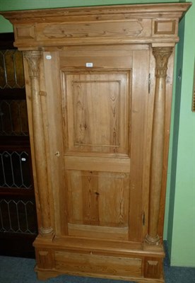 Lot 425 - A pine wardrobe