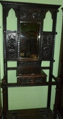 Lot 428 - Edwardian carved oak hallstand