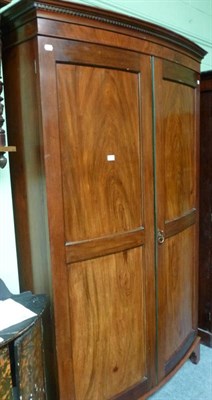 Lot 432 - A mahogany bow fronted wardrobe