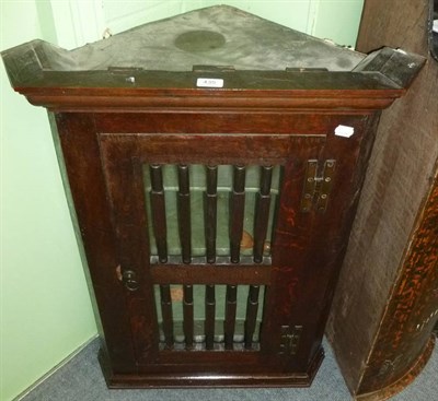 Lot 435 - Oak hanging corner cupboard