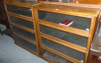 Lot 437 - Two oak four height stacking bookcases