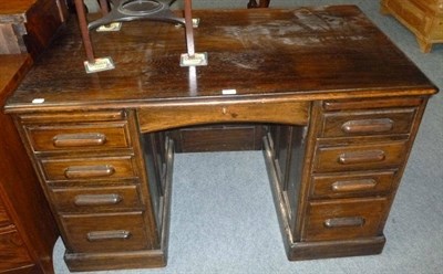 Lot 457 - An oak desk