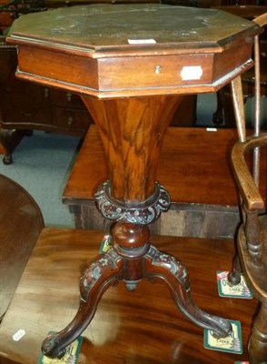 Lot 461 - A walnut sewing table