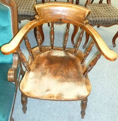 Lot 476 - A Victorian ash and elm smokers bow armchair