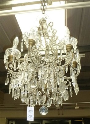 Lot 495 - A six branch glass chandelier