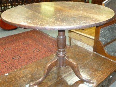 Lot 502 - 18th century oak tripod table