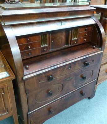 Lot 510 - A 19th century Continental mahogany cylinder bureau