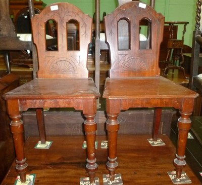 Lot 512 - Pair of Victorian mahogany hall chairs