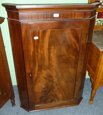 Lot 530 - A mahogany hanging corner cupboard