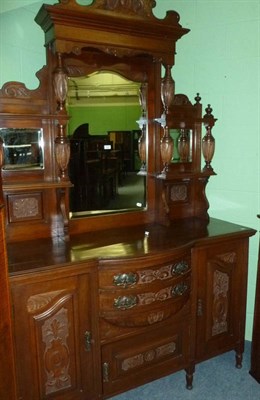 Lot 531 - An Art Nouveau walnut mirror back sideboard