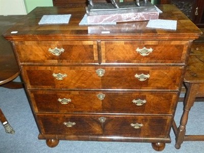 Lot 543 - Walnut four height chest of drawers