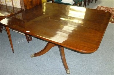 Lot 544 - A George III mahogany breakfast table, early 19th century, the broad rectangular top raised on...