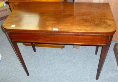 Lot 550 - A 19th century mahogany fold over card table