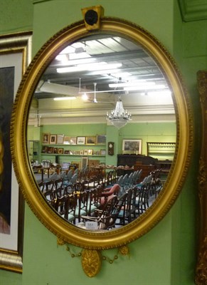 Lot 551 - Gilt framed oval wall mirror